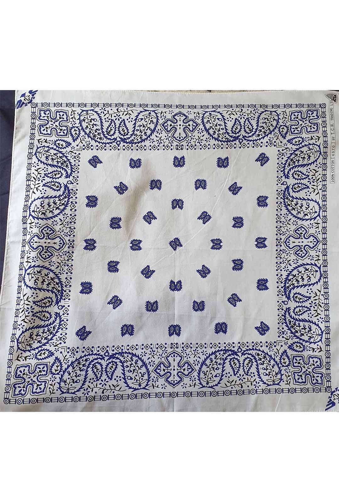 white bandana with blue and black paisley print