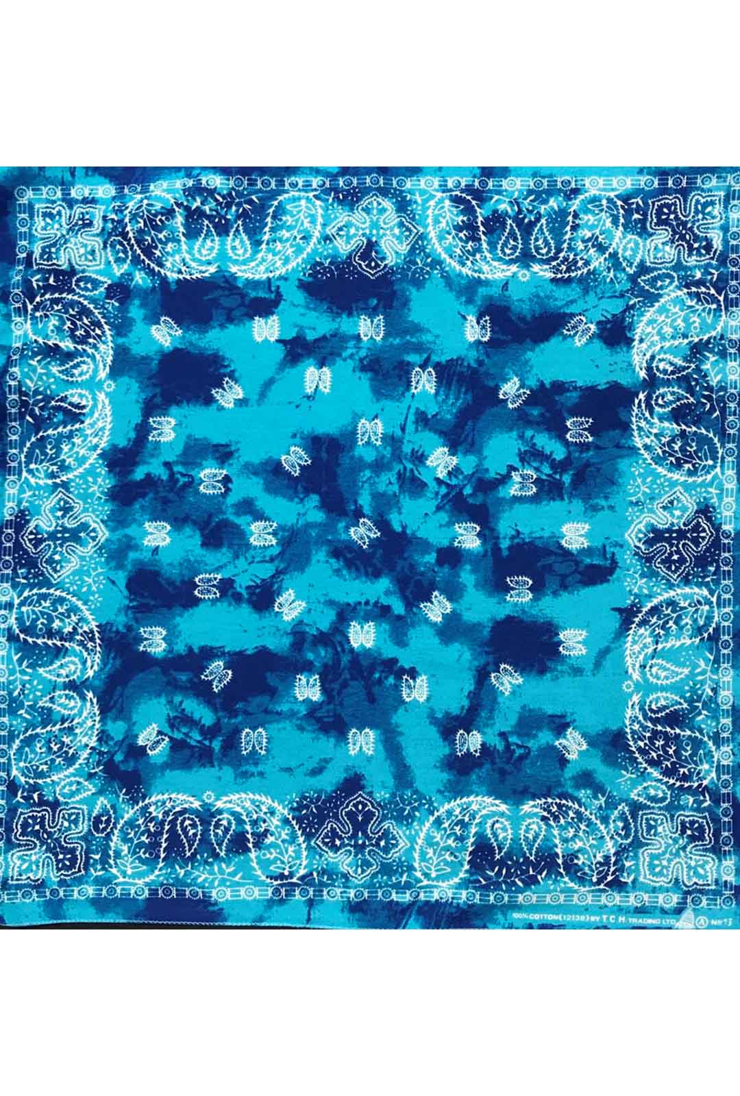 dark blue and light blue tie dye print. overlay with white paisley print