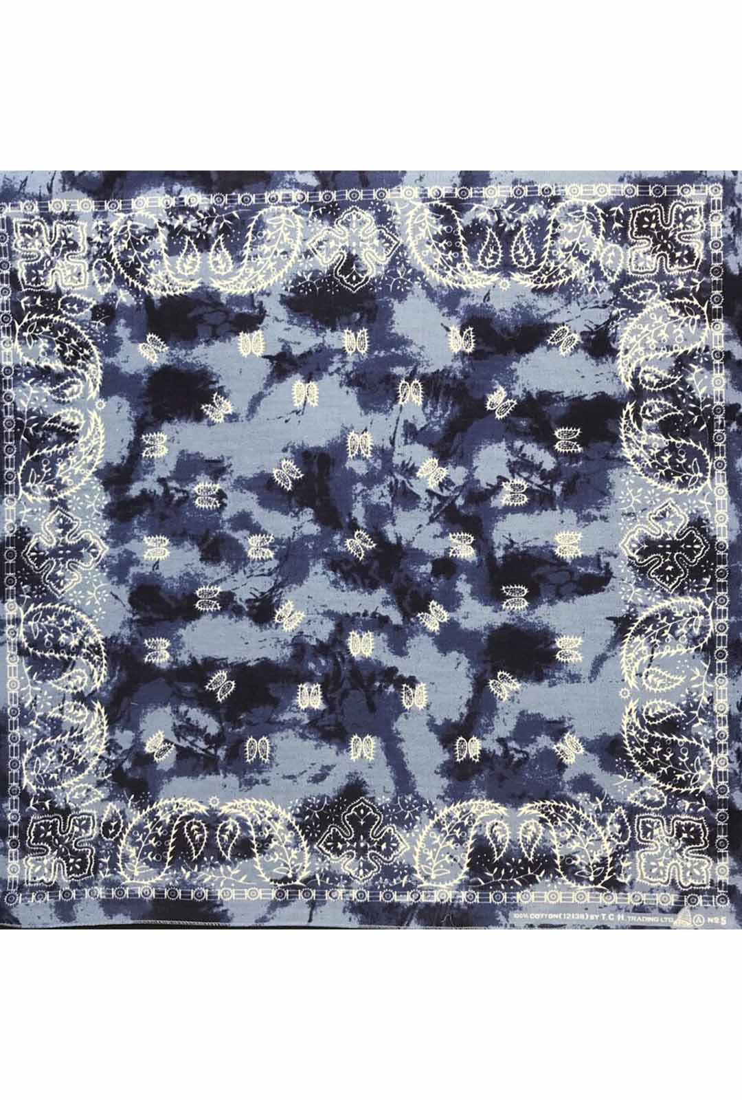 navy blue tie dye bandana with white paisley print.