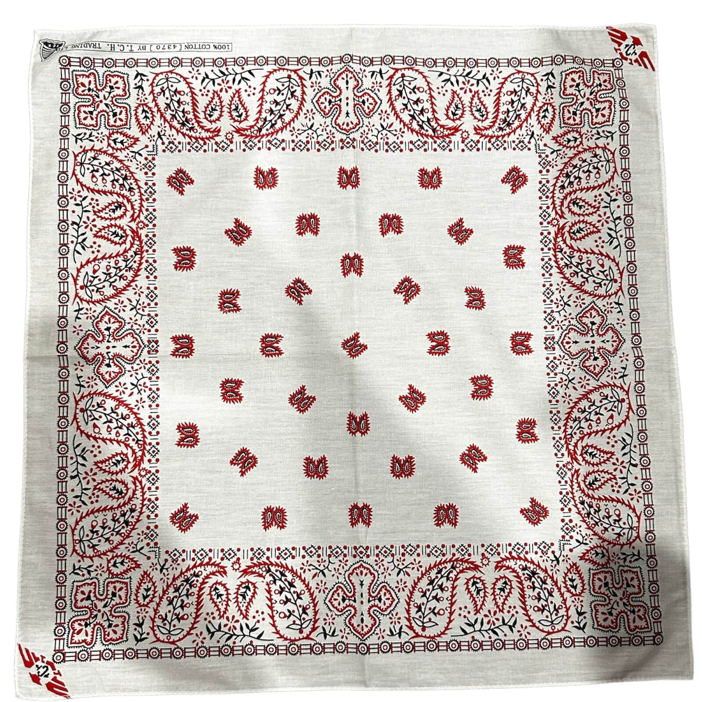 white bandana with red and black paisley print.