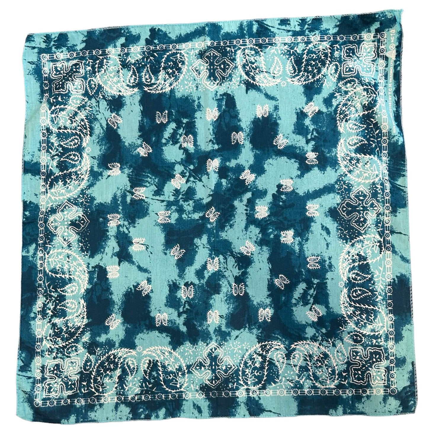 light and dark blue tie dye print bandana with white paisley print