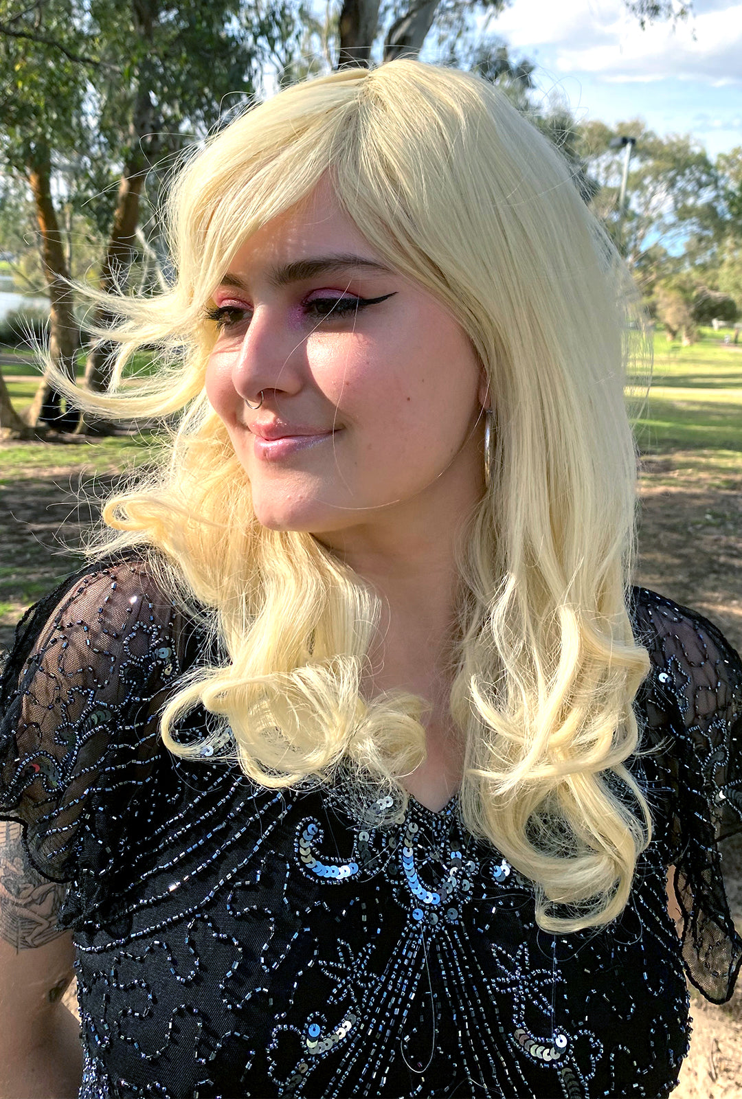 Deluxe Blonde Mid Length Curly Wig