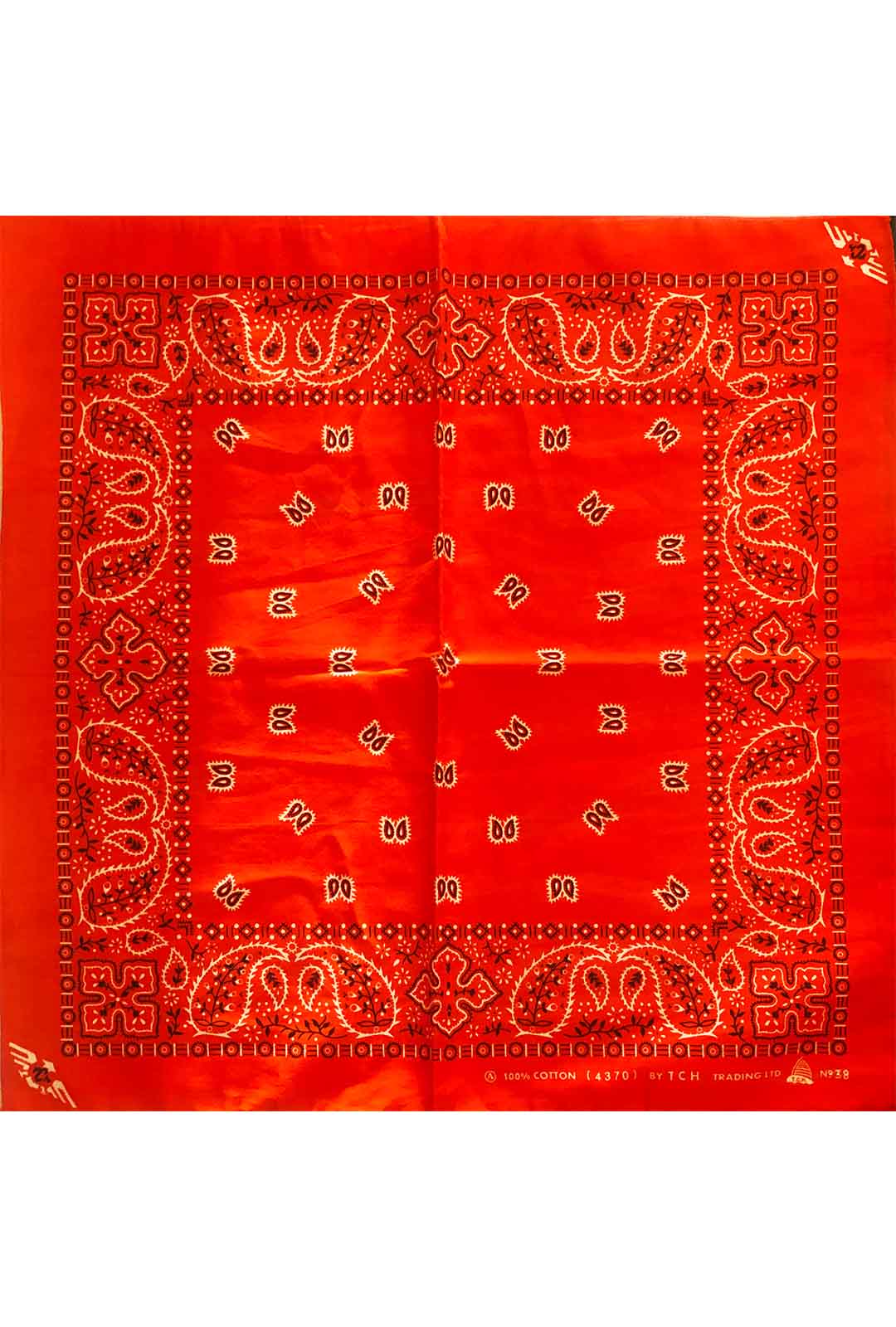 deep orange bandana with white and black paisley print