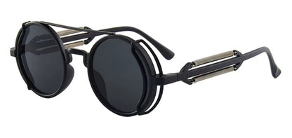 black round steampunk glasses with spring detailing and black tinted circle lenses