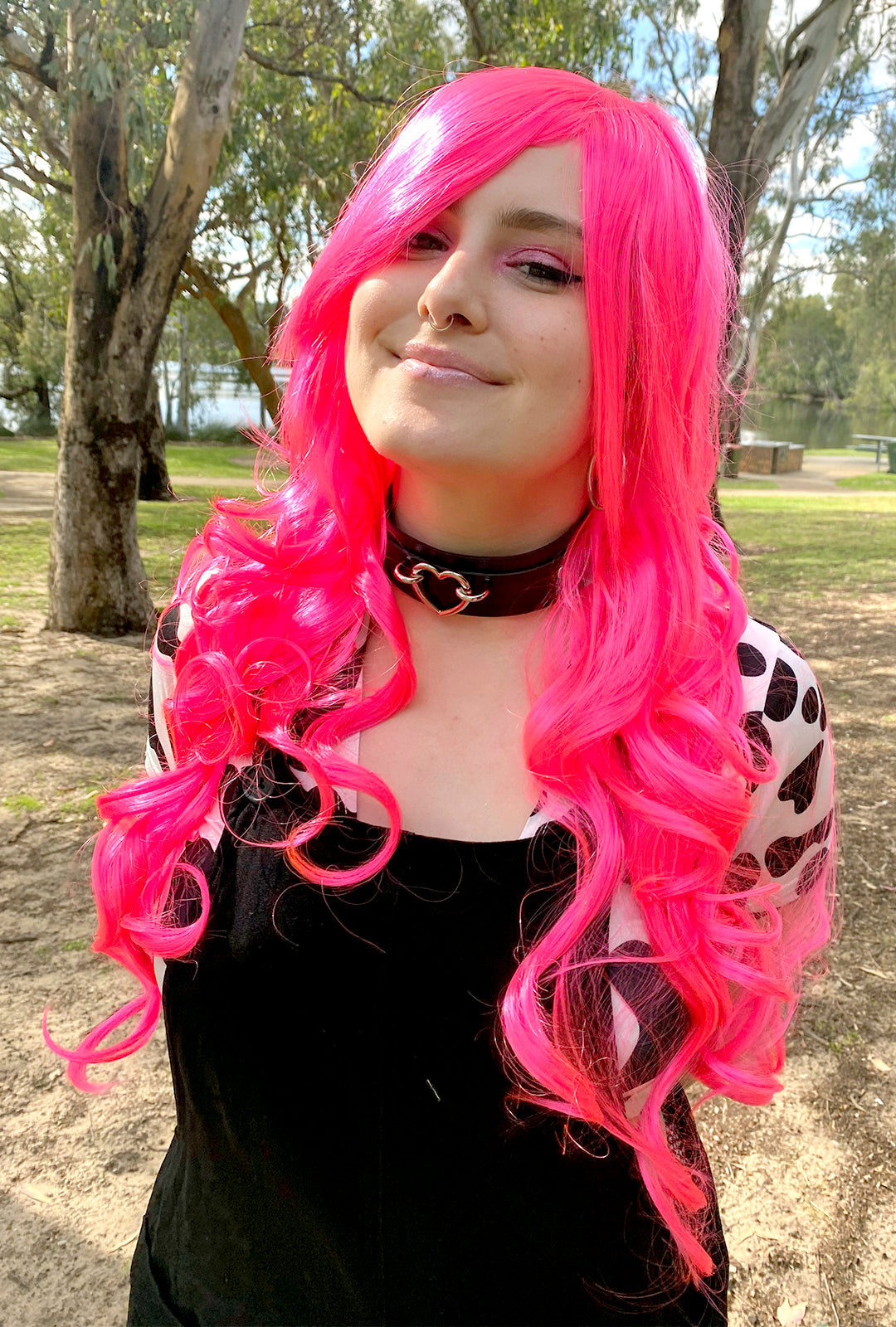 Deluxe Long Neon Pink Curly Wig